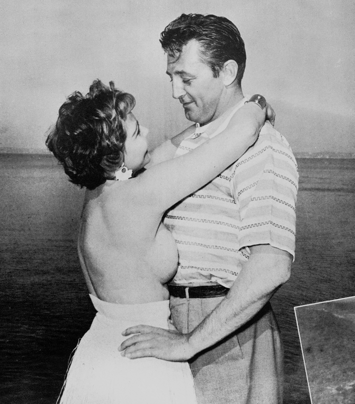Robert Mitchum gets to grips with the publicity seeking British actress, Si...