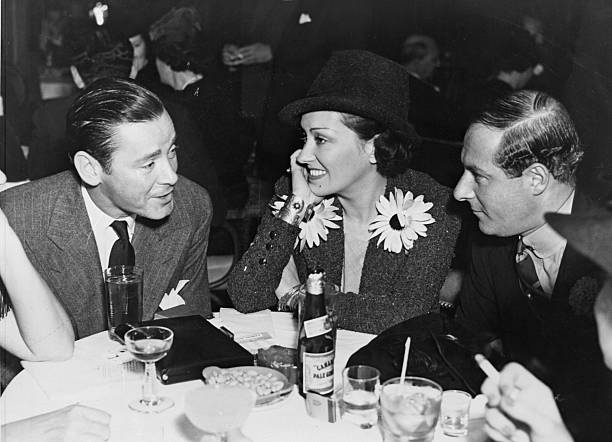 Herbert Marshall, Gloria Swanson, George Jessel