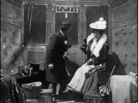 A Kiss in the Tunnel (1899)