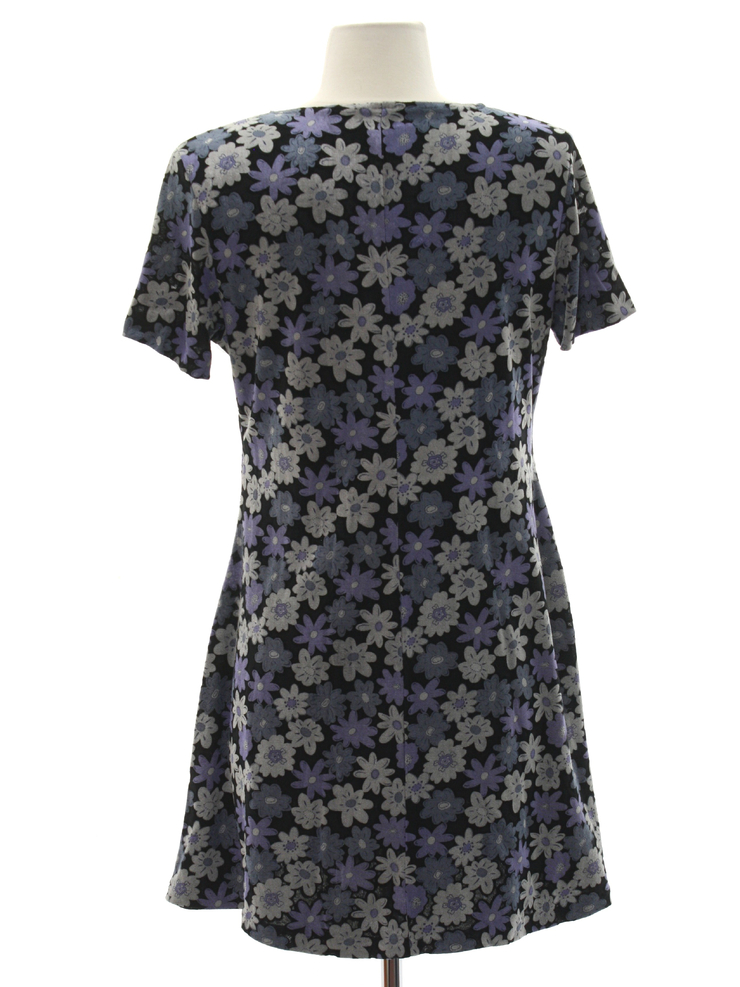 Nineties Vintage Dress: 90s or newer -S. Roberts- Womens black background rayon nylon blend short sleeve above the knee length mod dress. Semi-scoop neckline. Cute busy abstract flower-power print in 