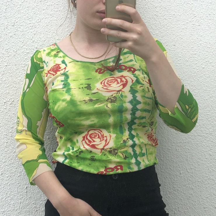 Picture of 90s mesh top \nLike green, black and red \nTie dye...