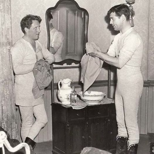 Clark Gable and Spencer Tracy washing up in their