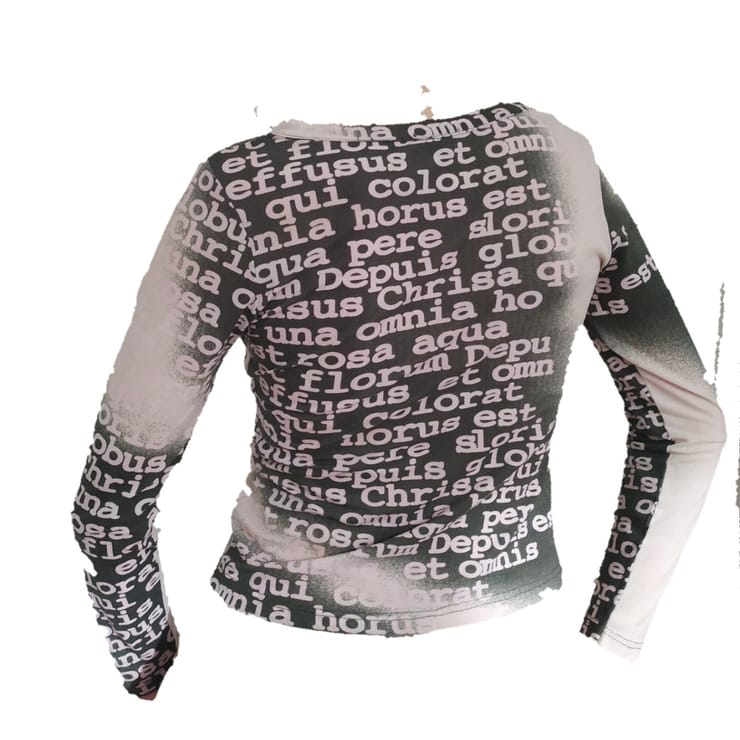 Pink and black mesh top with latin writing...