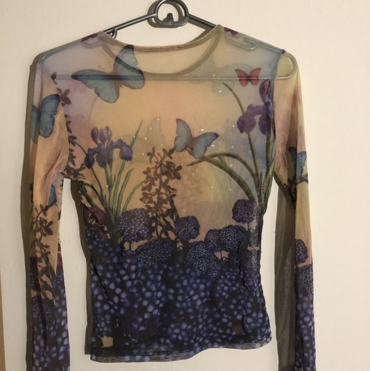-Super dope butterfly mesh top\n-great condition...