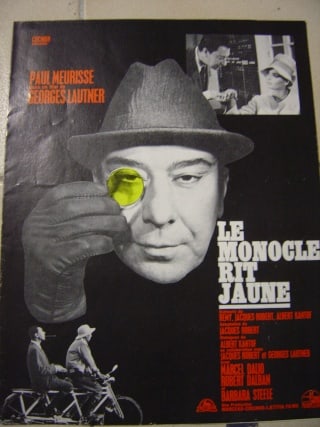 Le monocle rit jaune